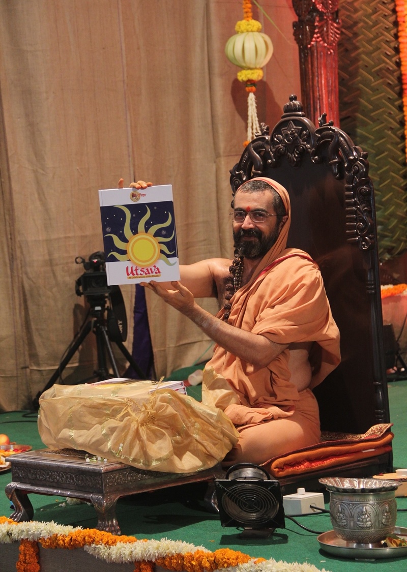 Utsava book release by Parama Pujya Swamiji